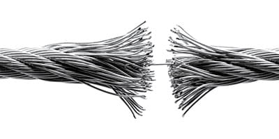Image of a braided metal cable separating